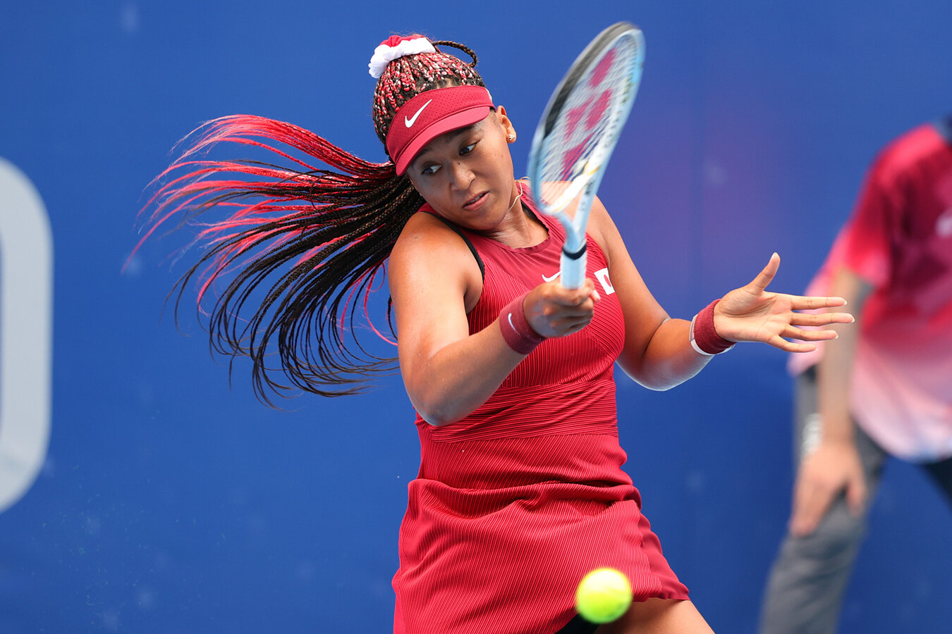 Naomi Osaka plays a shot during the Women's Tennis Round 2 match against Viktorija Golubic