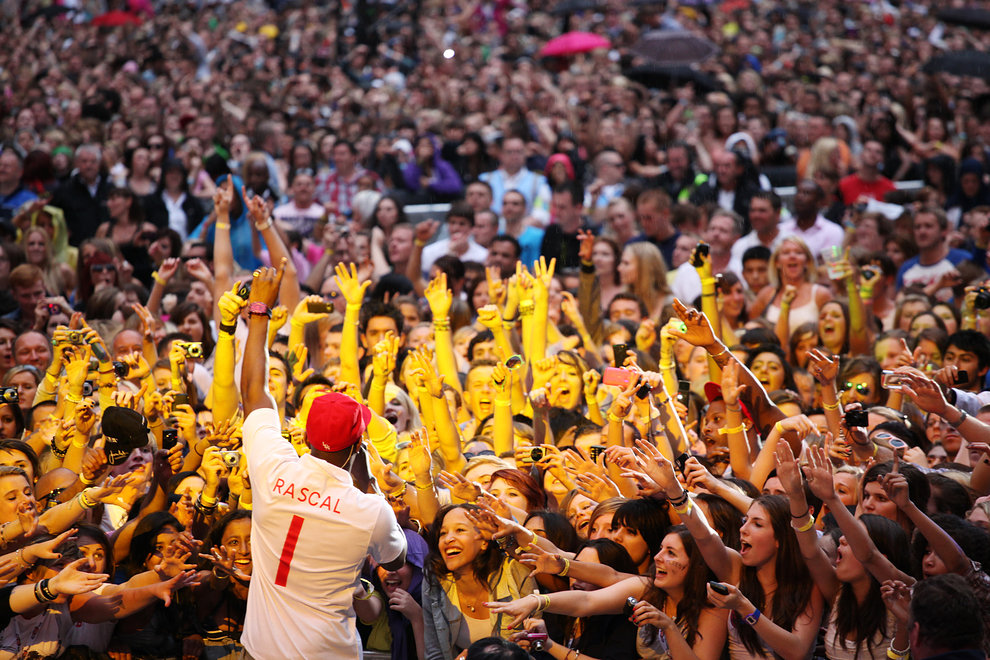 Dizzee Rascal embraces the crowd 