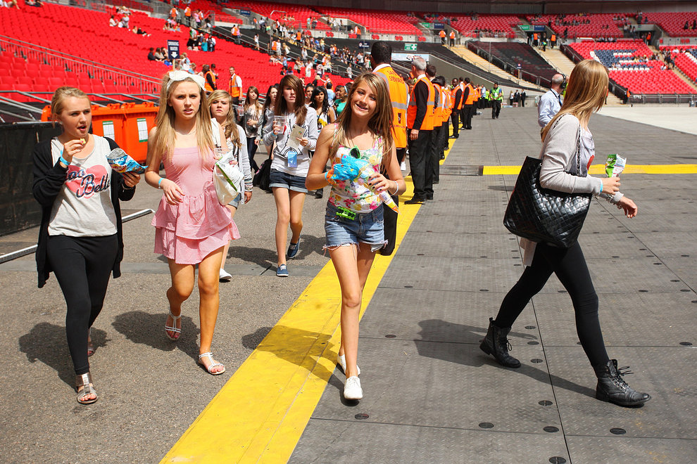 Fans rush to take their places 